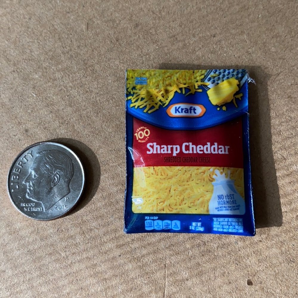 5/$10 Mini Brands Toy: Kraft Sharp Cheddar Shredded Cheese